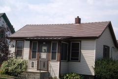 Oxford and Standing Seam Metal Roofing in Caramel