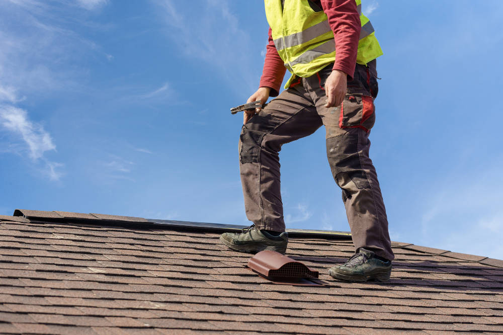 metal-roof-over-asphalt-American-Metal-Roofs-WI